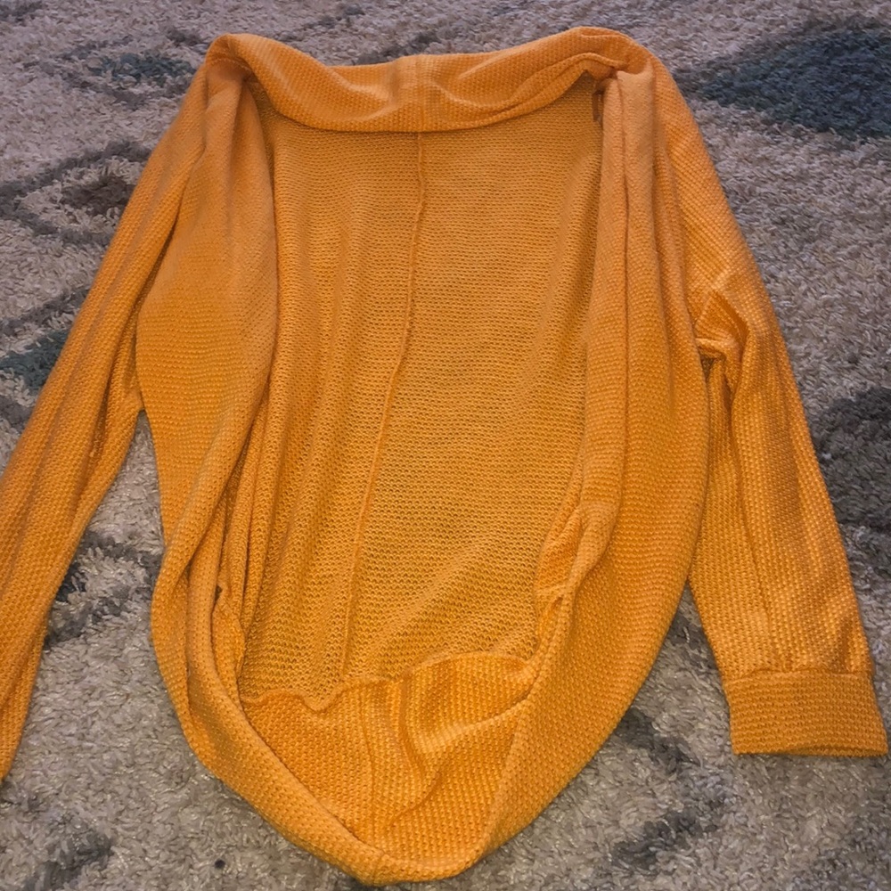 A yellow cardigan